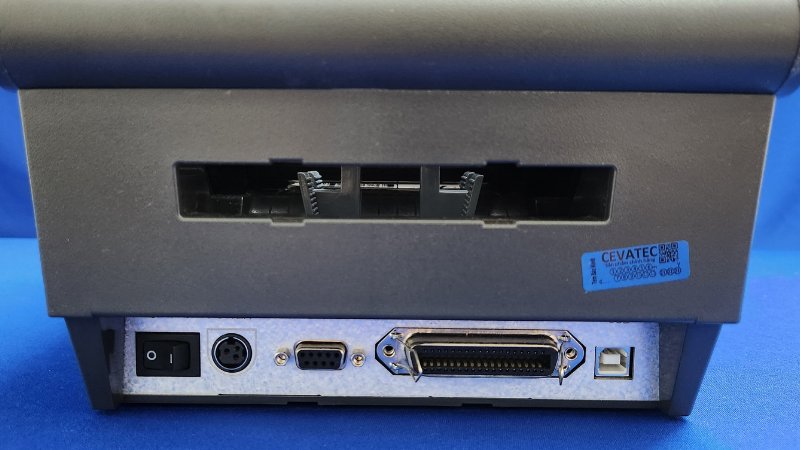 Hình chụp mặt sau máy in Bixolon SLP TX400 thấy rõ các cổng kết nối gồm USB, Serial, Parallel.